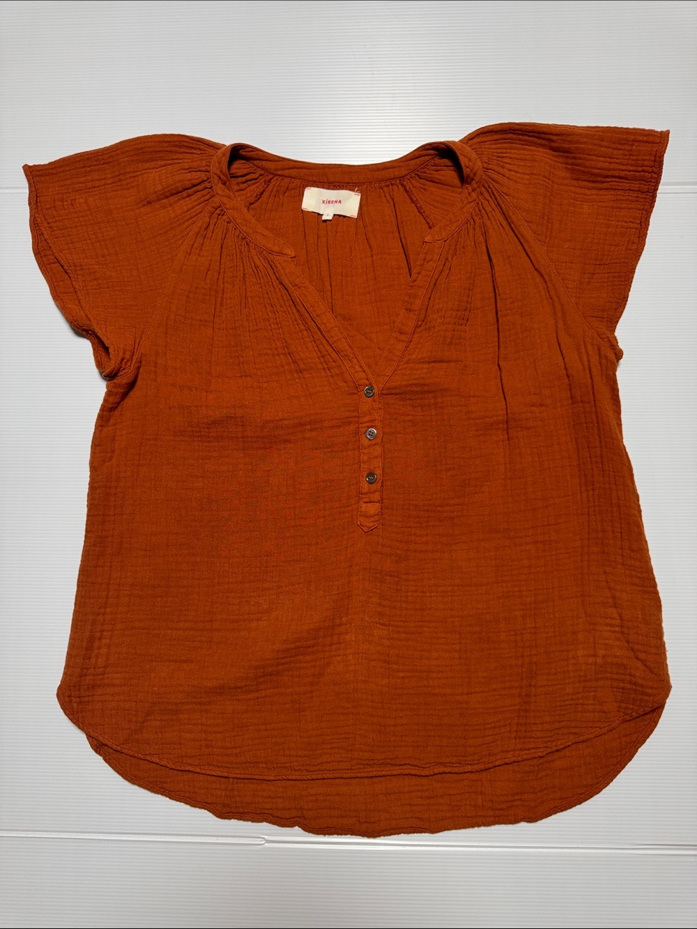 XIRENA Kane Top Picante Rust Slub Cotton Gauze VNeck Henley Top Flutter Sleeve S